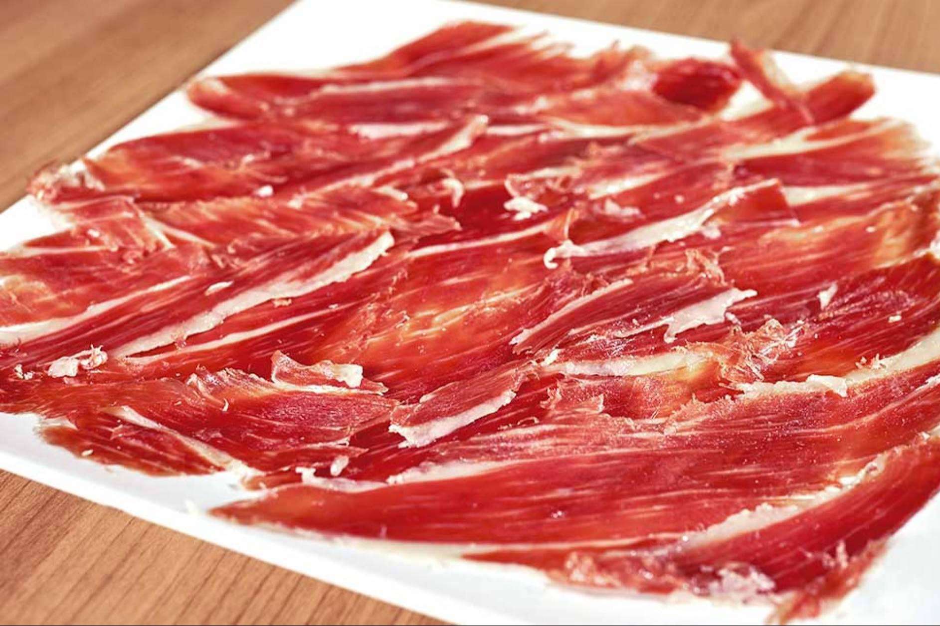 Los dos productos gourmet de Bocados de Huelva que no pueden faltar en la mesa estas Navidades, jamón ibérico y gamba blanca a domicilio